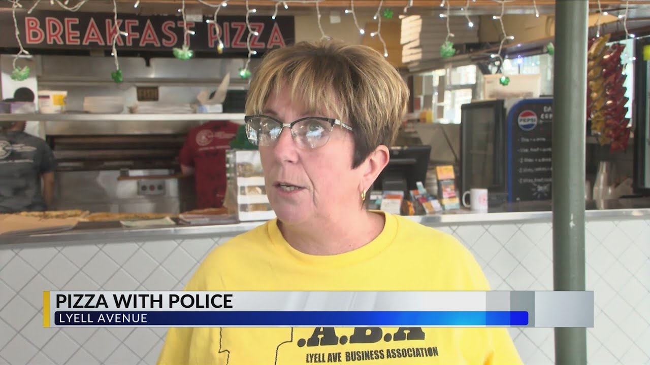 Pizza with police on Lyell Ave