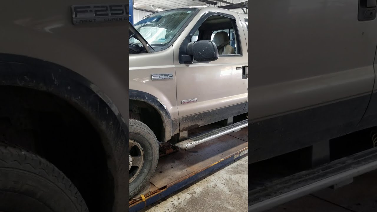 Замена муфты вентилятора, снятие кожуха, снятие ремня водяного насоса на Ford F250 2005 года выпу...