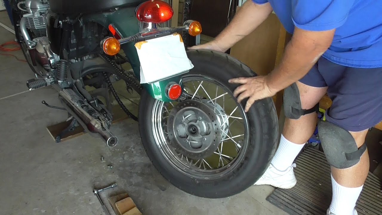 2001 Triumph Bonneville Rear Wheel remove/replace - No muffler removal.