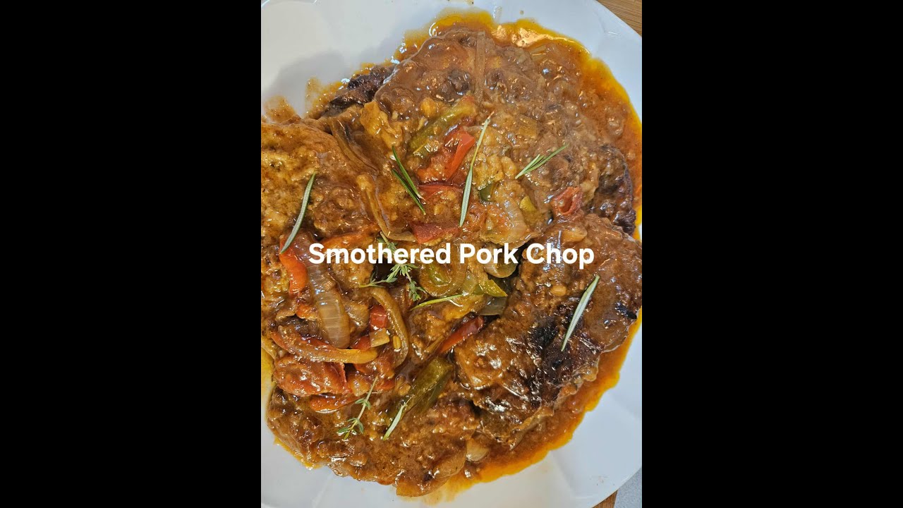 Smothered Pork Chops #porkchops #smotheredporkchops #caribbeanrecipes #comfortfood