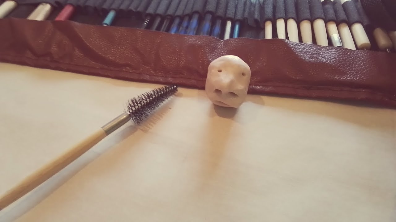 Funny face out of clay 