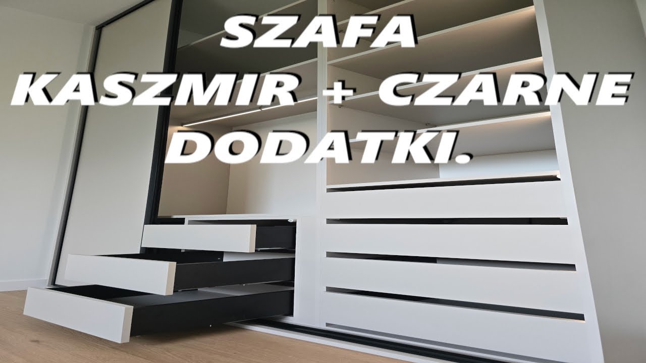 Szafa na wymiar z drzwiami przesuwnymi. Kaszmir i czarne dodatki.