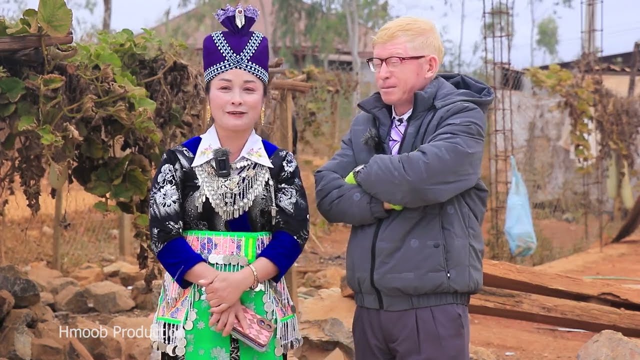 Suab kwv txhiaj moos uab kho siab By Txhiaj kaus Xyooj thiab Kaj siab Vaj