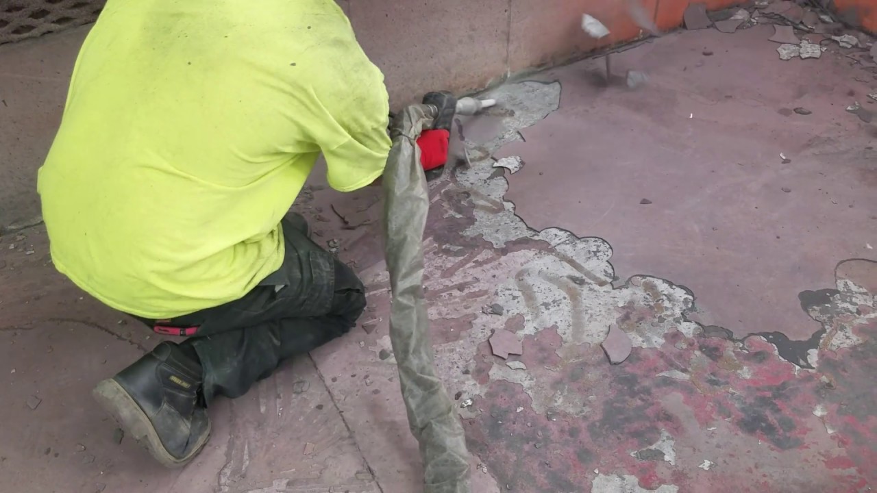 Blasting body shop paint booth floor buildup removed Part 2
