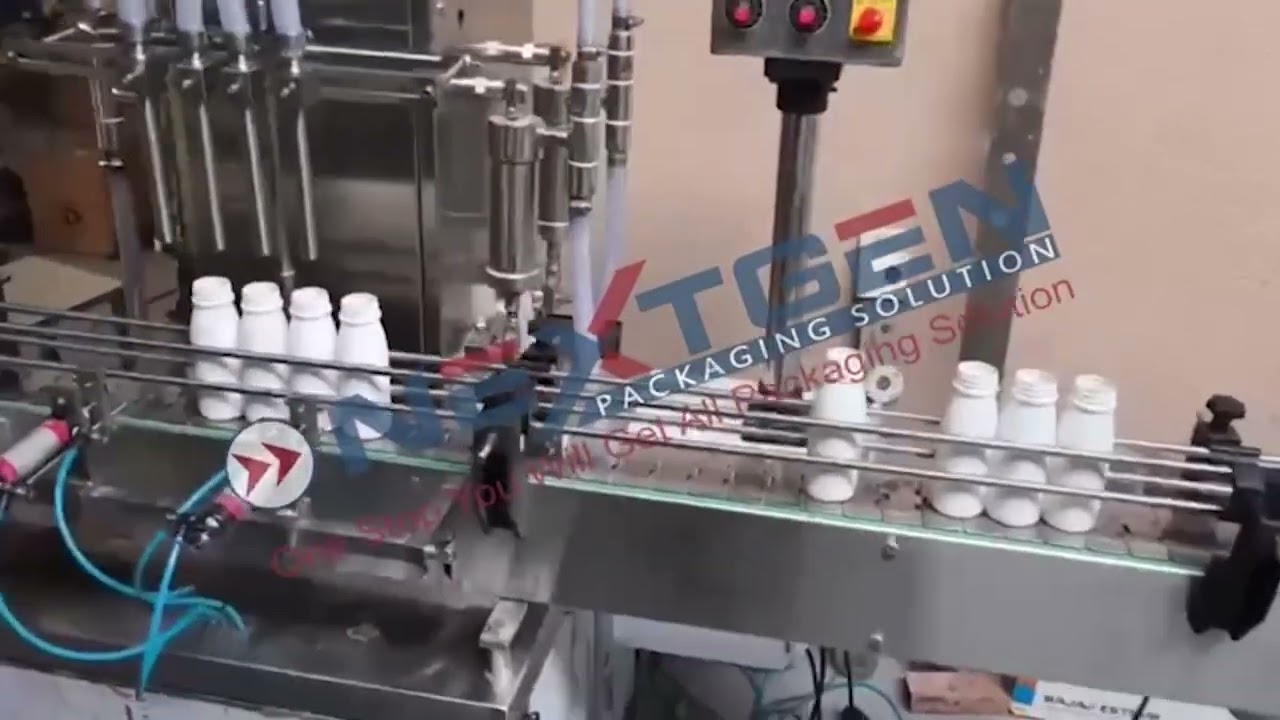 4 Head Automatic Volumetric Filling Machine | Liquid Filling Solution by Nextgen Packaging Solution