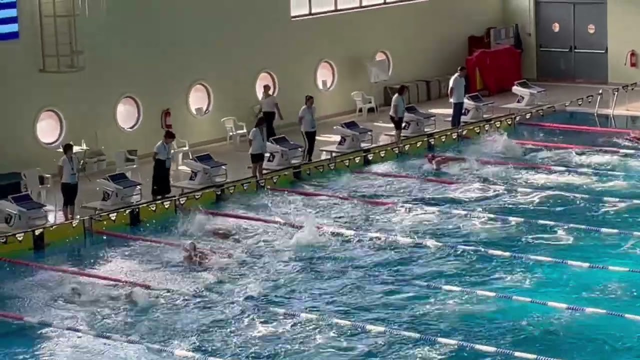 George Baniotis swimming 100m BUTTERFLY lane 6