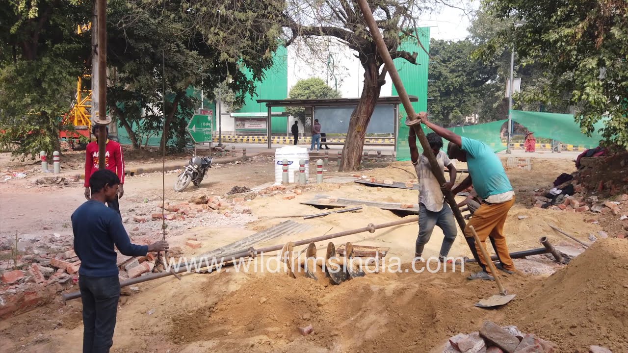 Heavy manual work by Indian labourers | Manual borehole drilling | Construction in India
