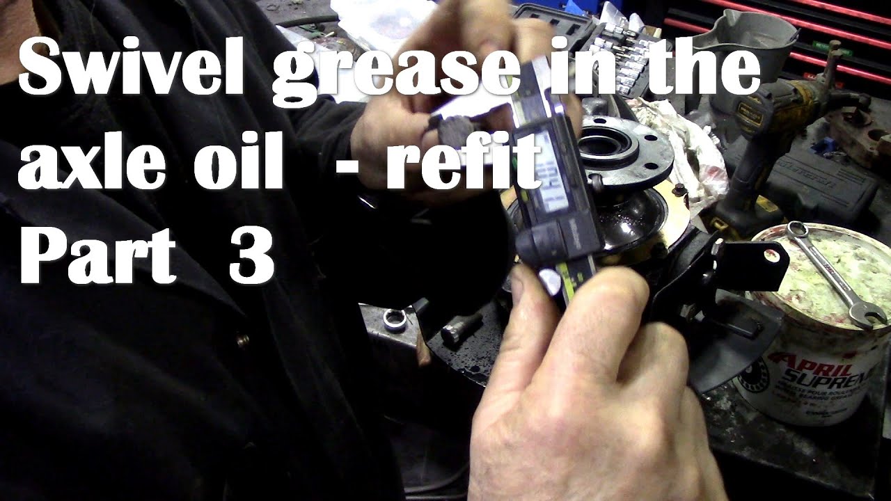 Swivel grease in the axle oil - needs a strip down.   Refitting part 3