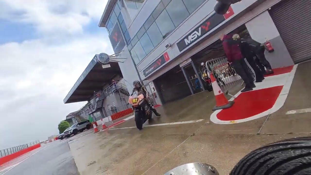 Mike Edwards rides the A&G Motorsport single cylinder 690cc motorcycle in a wet race at Donington
