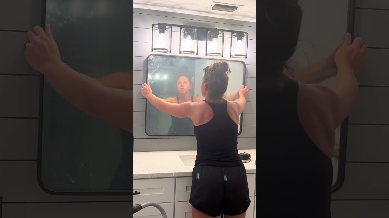 Switching out the bathroom mirror! This mirror was easy to hang with a French cleat!