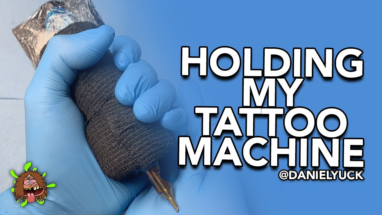 Holding A Tattoo Machine