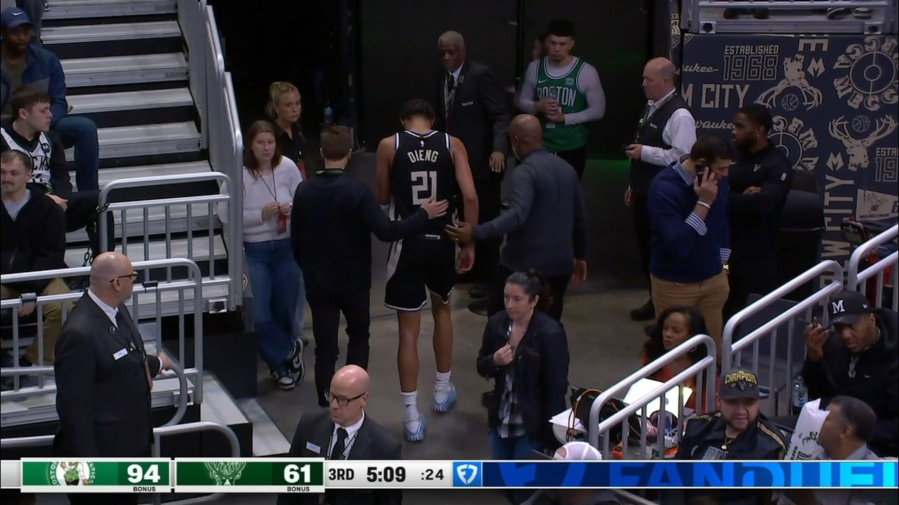 Ousmane Dieng hobbles to the locker room after Luka Garza lands on his foot - 4/3/26