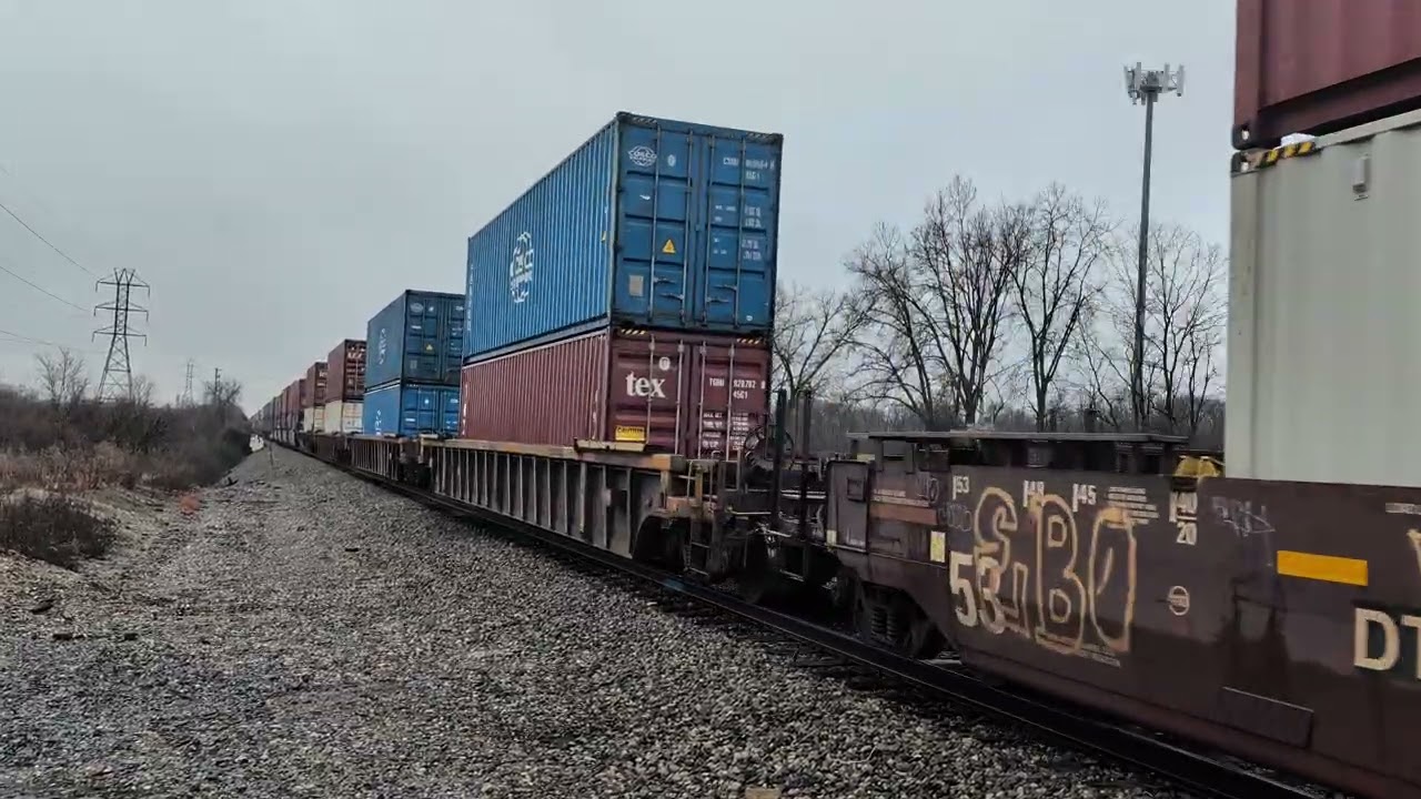 A single BNSF ES44C4 hauling a doublestack intermodal train.