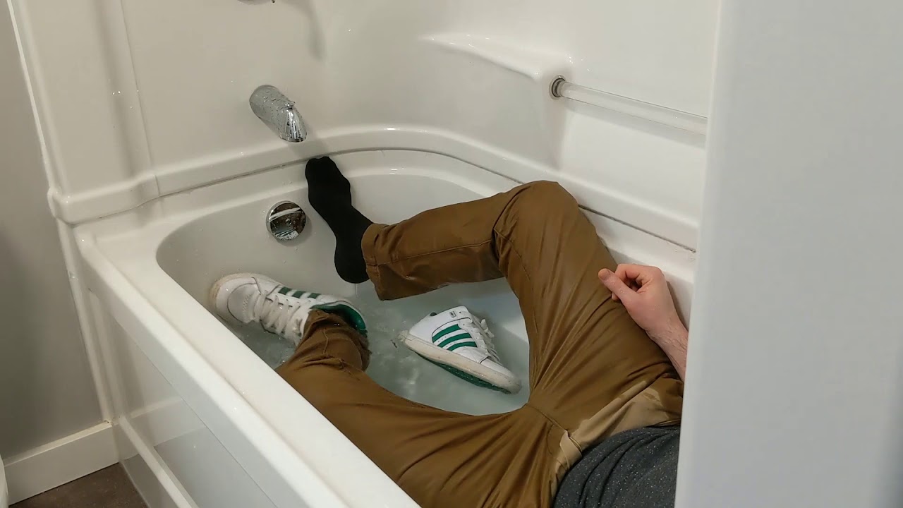 Adidas green white and CCM black socks