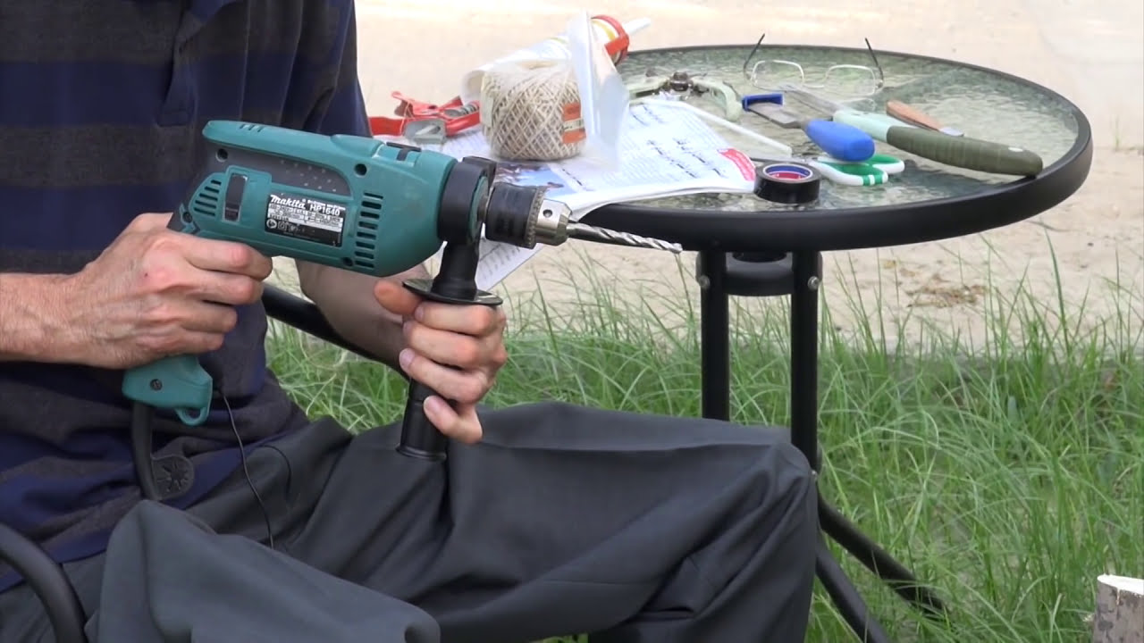 Grafting a tree with a drill تطعيم الشجرة بالدريل الكهربائي