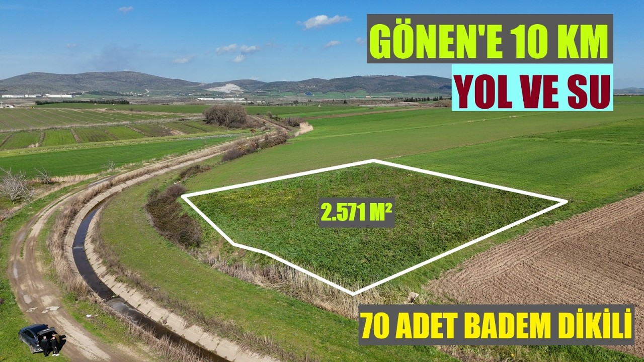 GÖNEN'DE YOLA KANALA CEPHE 70 CİVARI BADEM DİKİLİ 2.571 M² ARAZİ