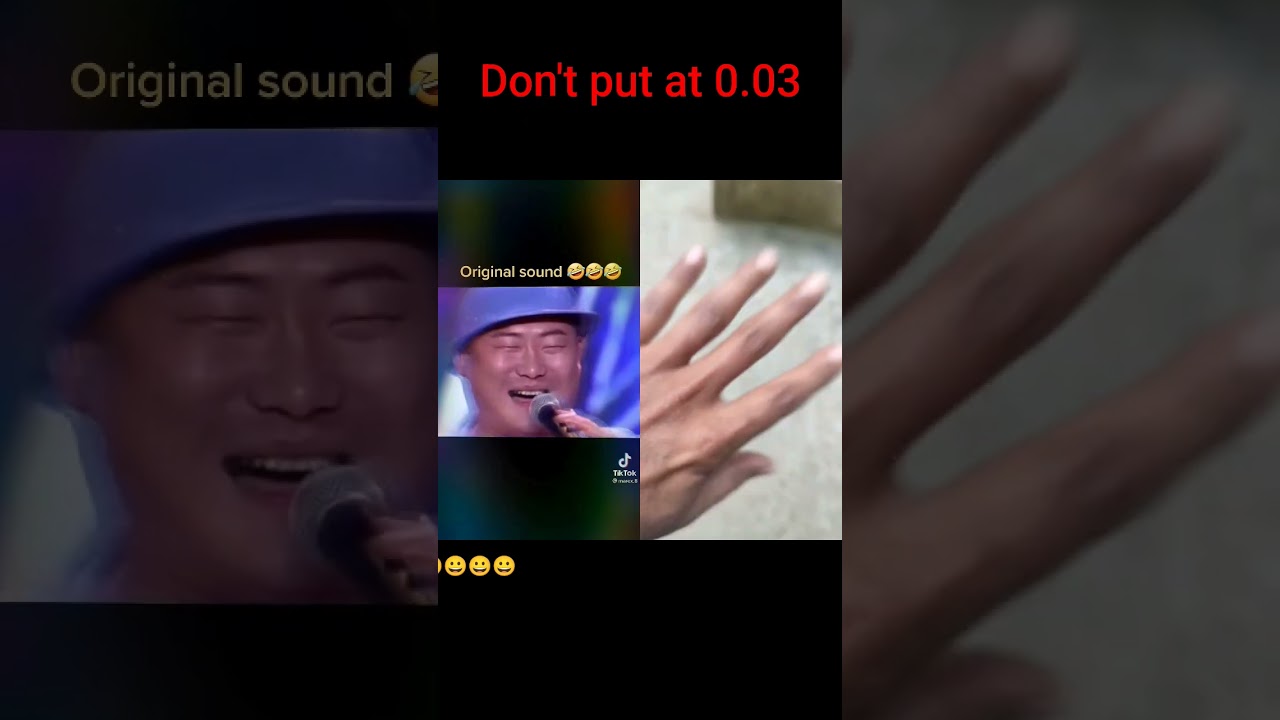 Chinese man loughfing 
