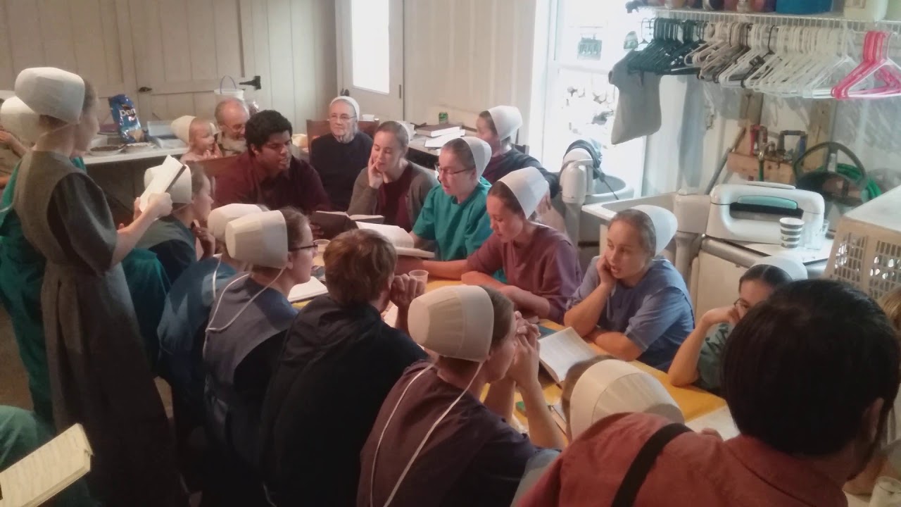 Amish gathering  singing theres a love beyond  the great  divide