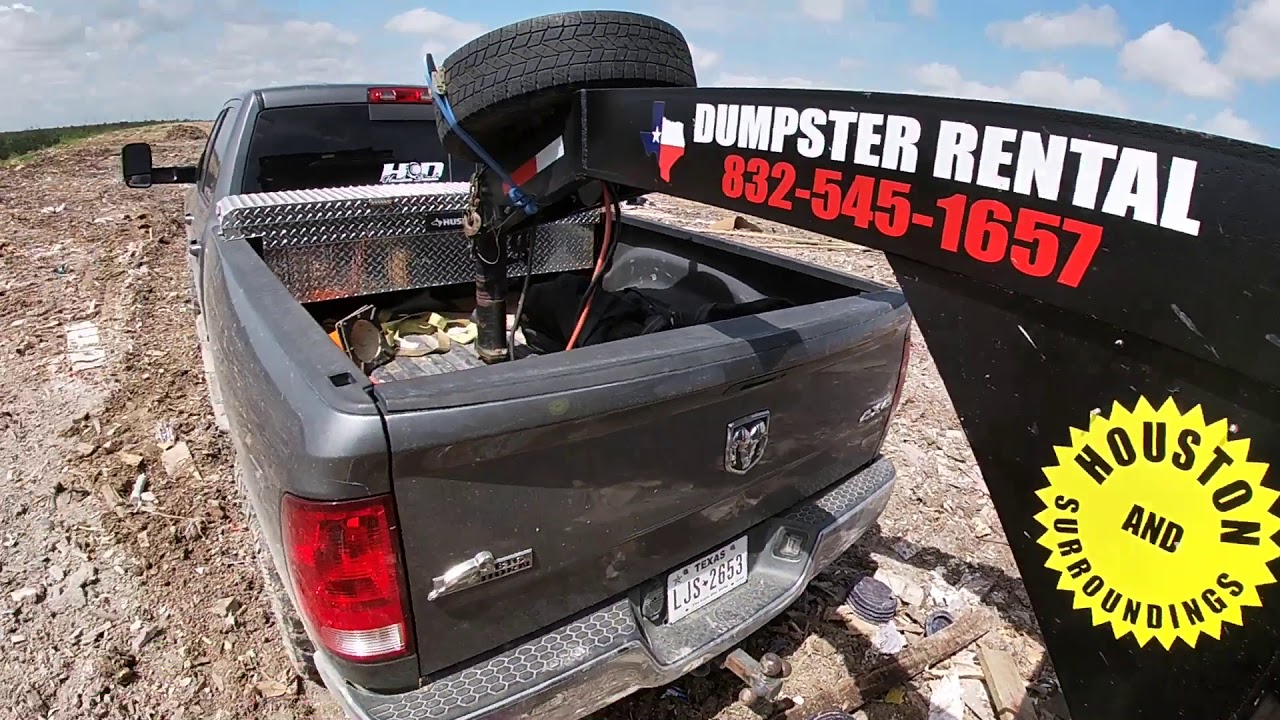 Dumping rolloff container at landfill