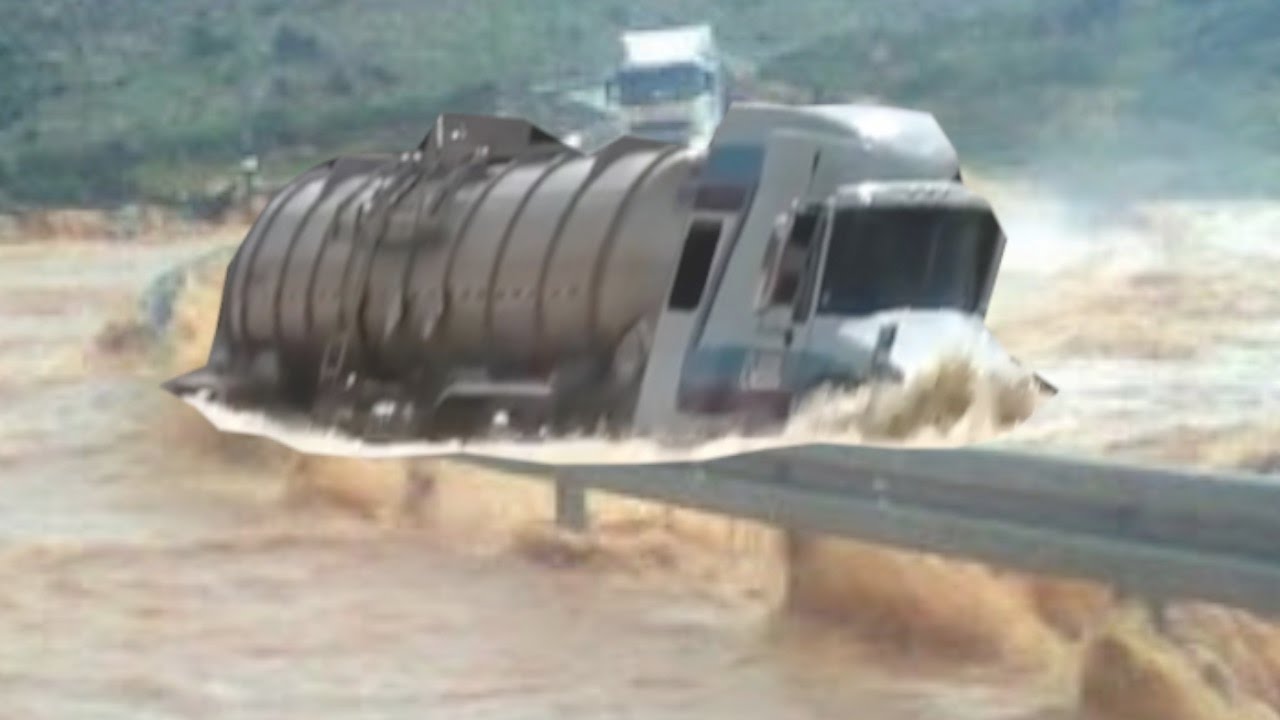 Truck Crossing Into Heavy River Flooding