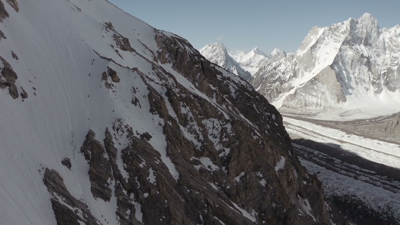 Stunning drone shot of climbers climbing Broad Peak 8051 meters