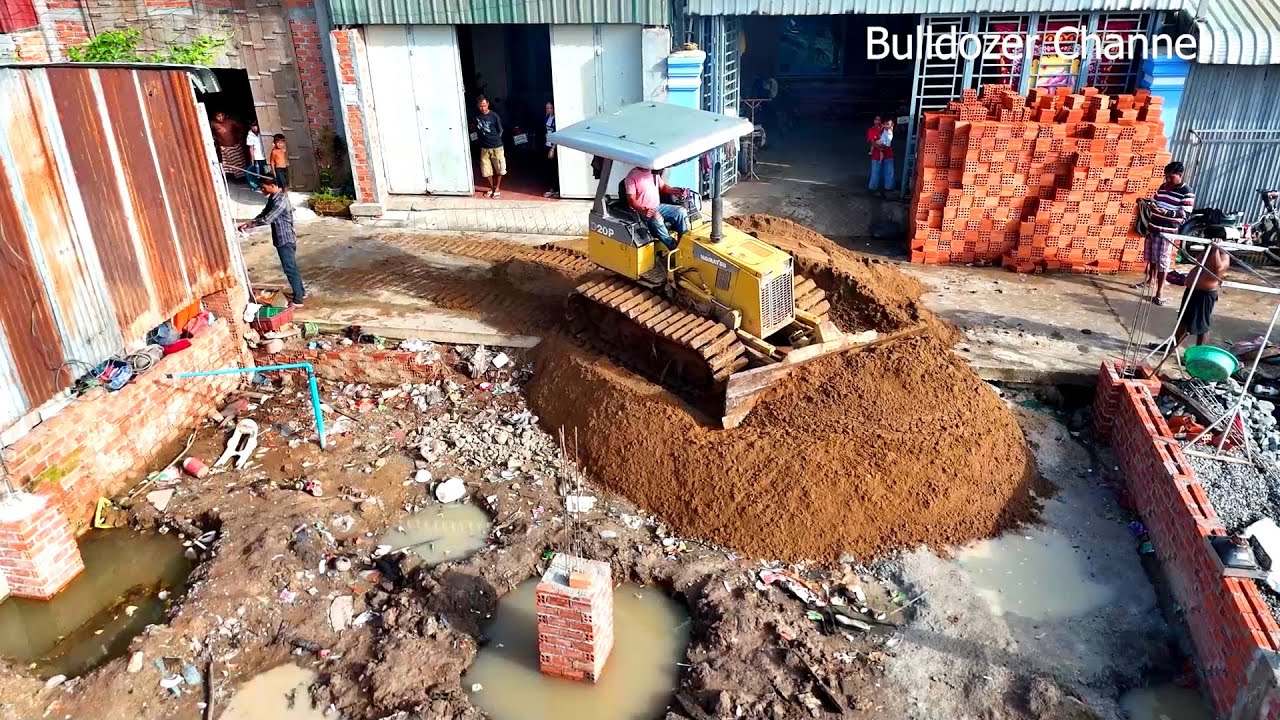 Wonderful project Support by Bulldozer KOMATSU D20P Truck 5T to pushing sand drop to Flooded land