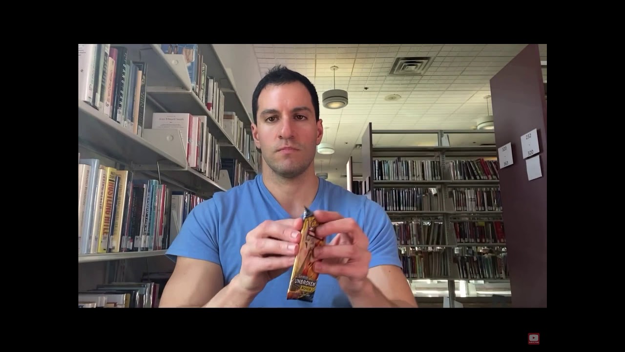 Leonhart Pulling Rainbow Rare Charizard and Reshiram GX in a Library