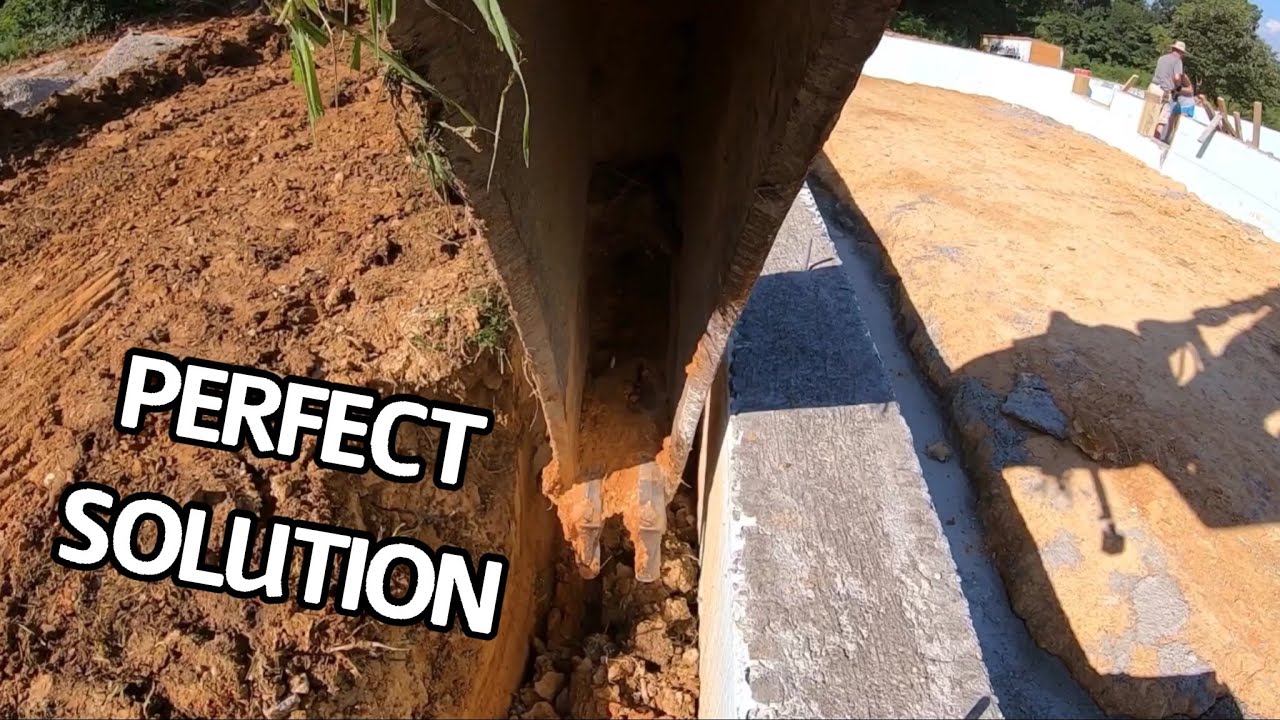 Excavating with Custom Trenching Bucket for Foundation Drain - Volvo 140