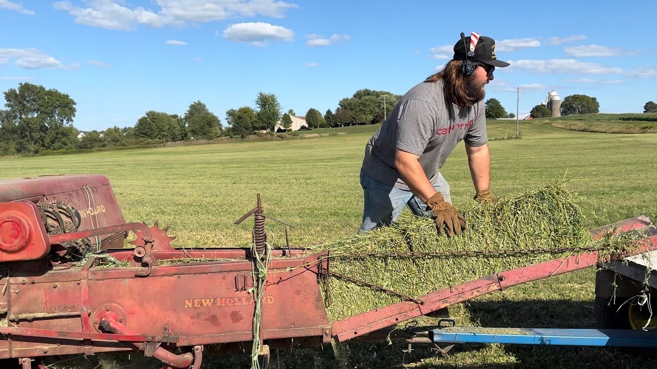 Dad makes his very first hay bale with son’s New Holland hayliner 68