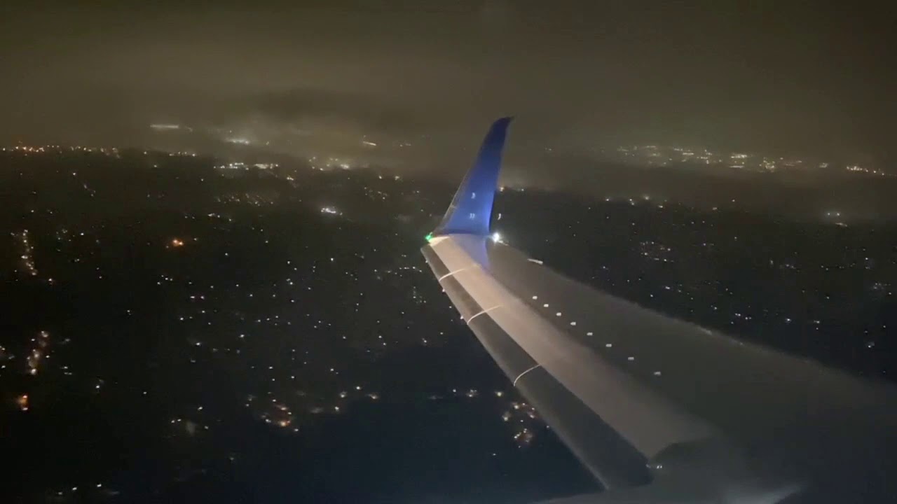 HEAVY RAIN LANDING AT ATLANTA DELTA BOEING 737-932ER