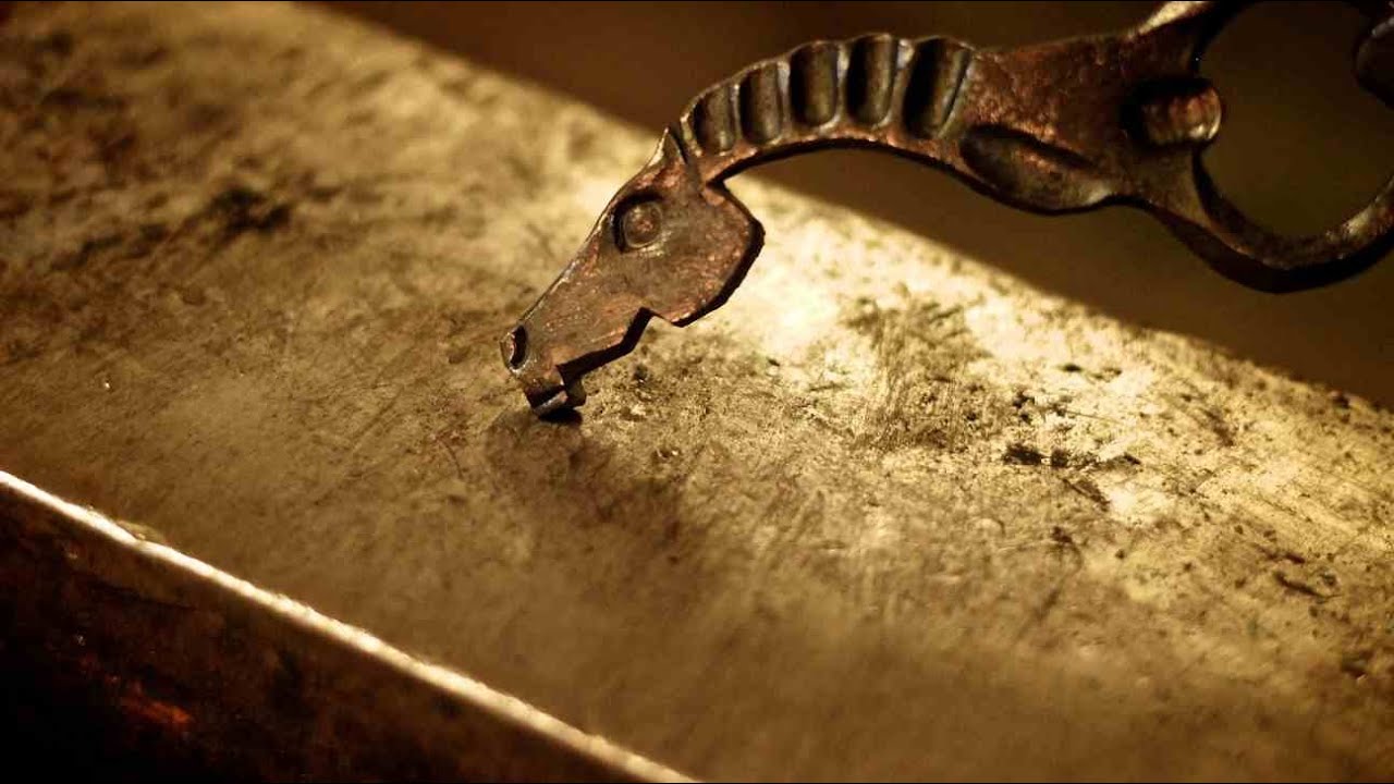 Forging a horsehead bottle opener