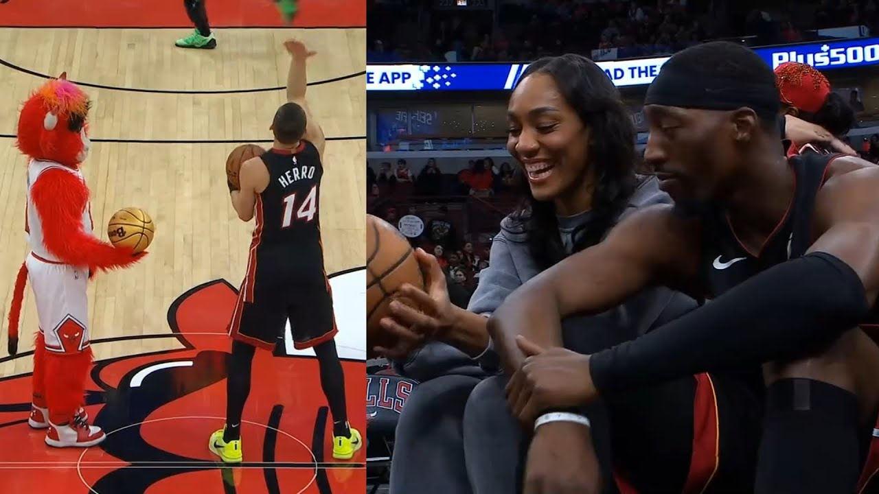 Bam Adebayo with A'ja Wilson and Tyler Herro vs Bulls mascot during game delay