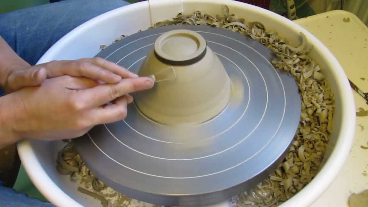 Pottery - trimming a foot on a thrown bowl