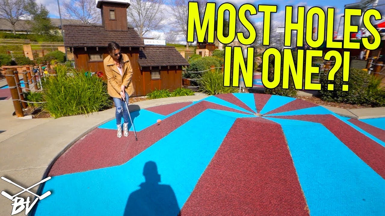 BREAKING OUR MINI GOLF HOLE IN ONE RECORD!