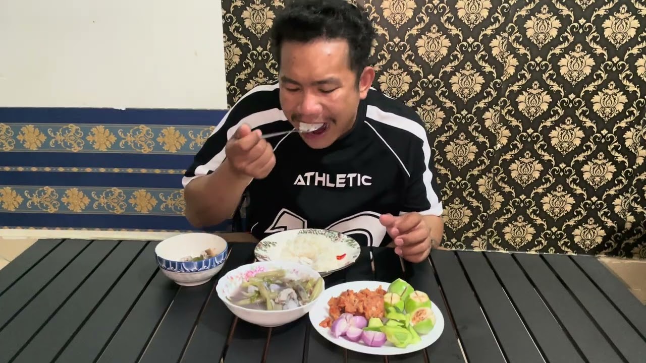 Eat sour soup with fried catfish. Cambodian food