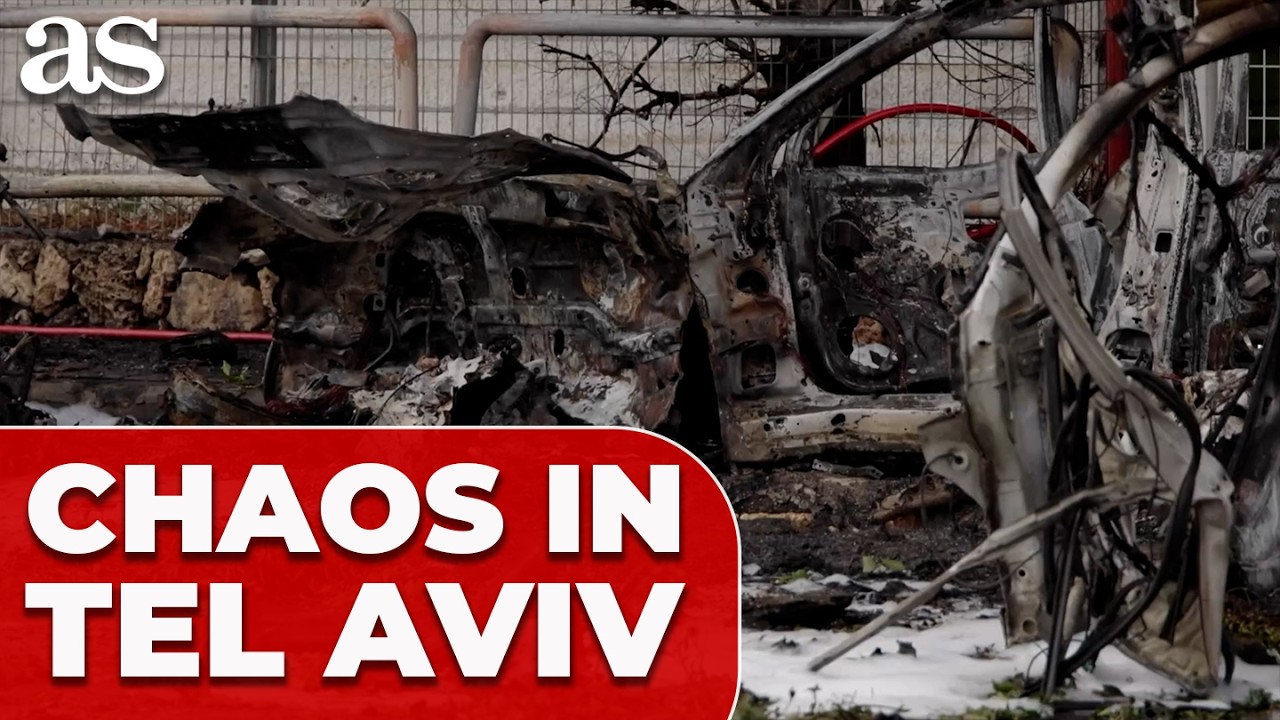 CHAOS IN TEL AVIV: Burnt cars and craters after IRANIAN MISSILE STRIKES