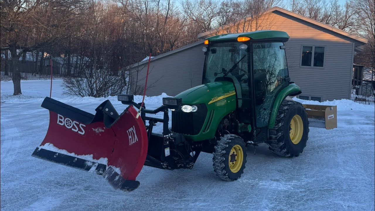 Commercial snow plowing in my 2008 John Deere 3720 with boss v plow