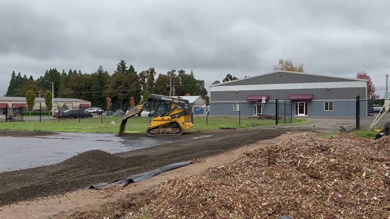 John Deere 333G Skid Steer Grading Gravel