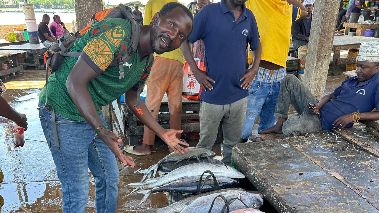 The biggest fish Market in Tanzania 🇹🇿 all fishermen and reseller gather here // Soko la samaki 