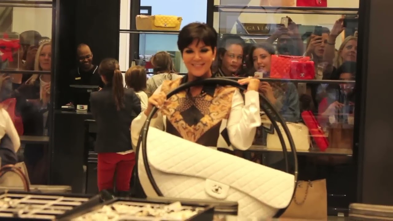 Kardashians try out a giant Chanel hula-hoop handbag in London