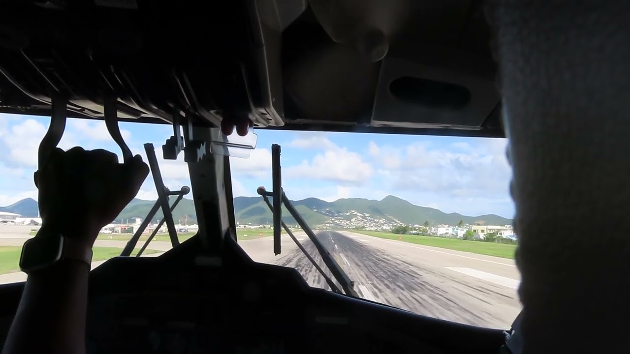 Landing at St Maarten in a Winair DHC 6 PJ-WIQ Twin Otter 7th October 2022