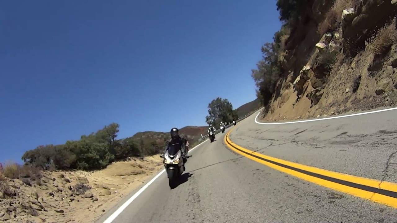 Cyclist joins, then overtakes motorcycles