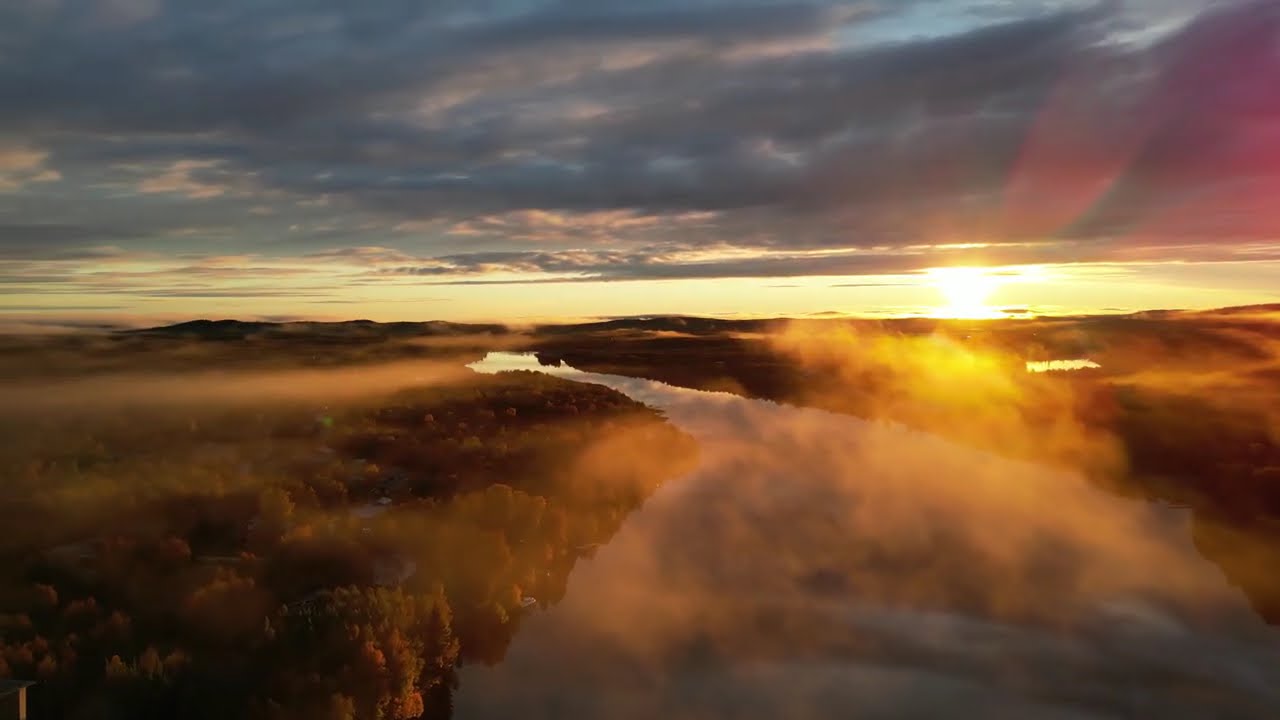 The golden fire of Ruska over the Ivalo River