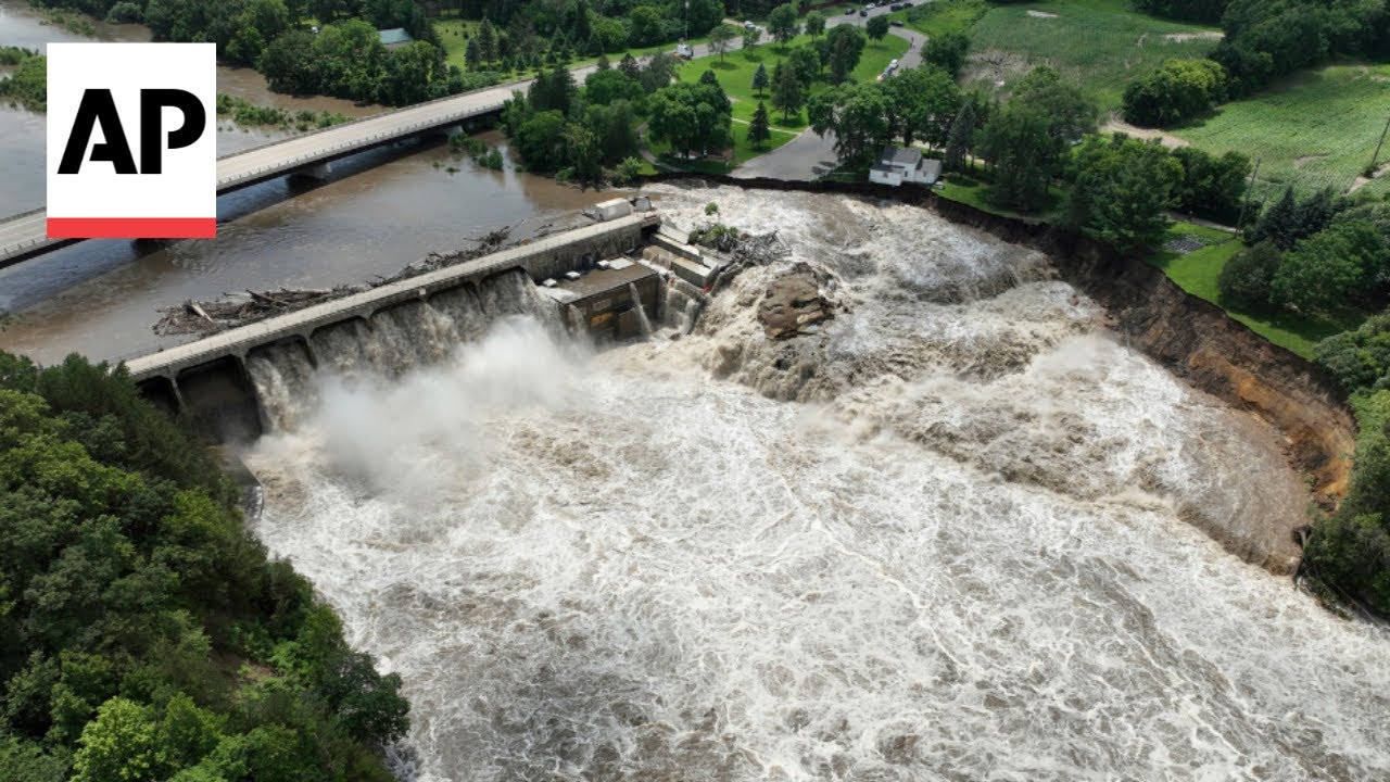 Minnesota dam still standing after floodwaters overcame parts of structure