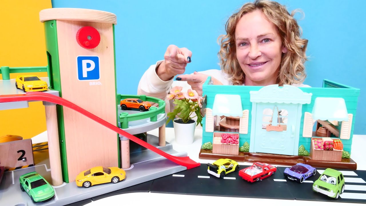 Spielzeug Video f&uuml;r Kinder mit Spielzeugautos und Nicole. Neuer Parkplatz f&uuml;r Autos