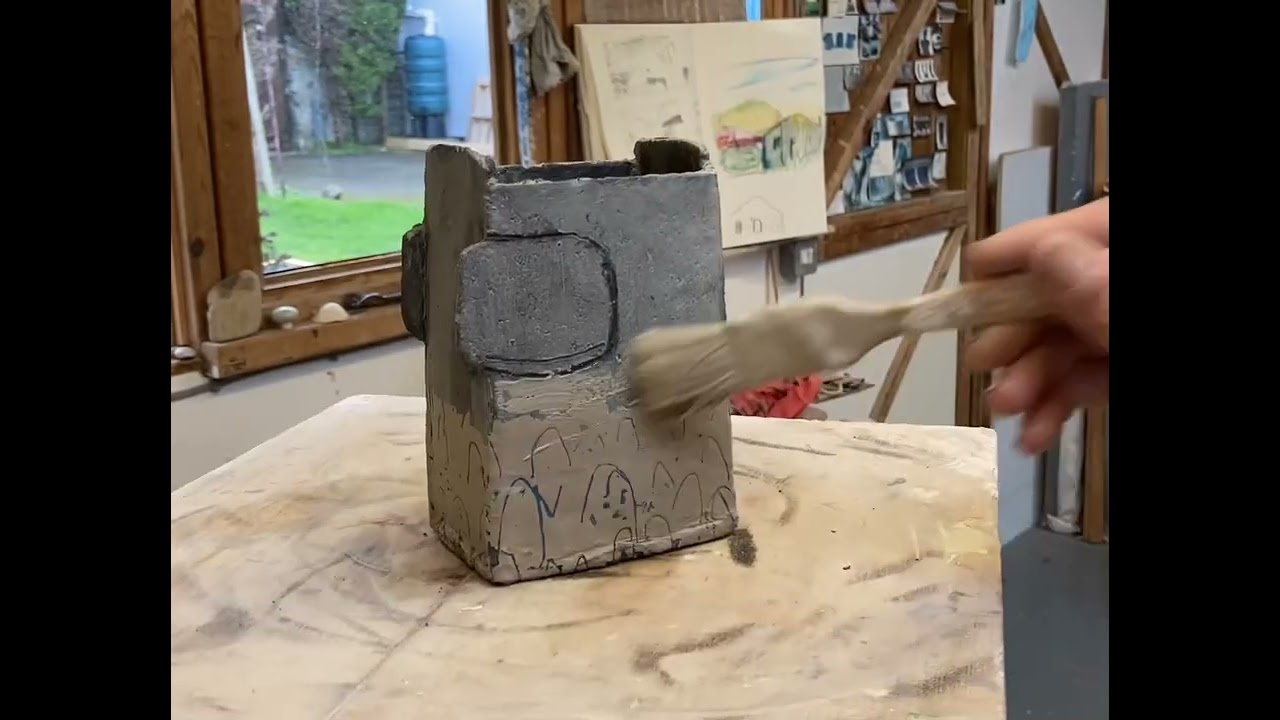 Painting a black clay slab pot