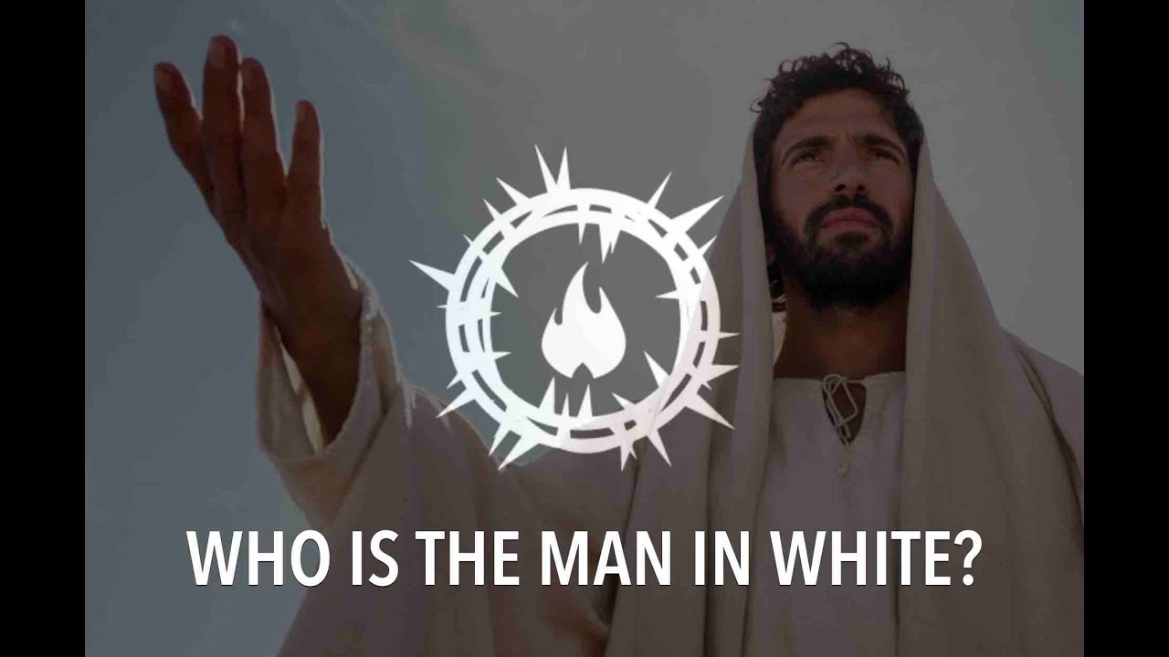 Who is the Man in White Who Keeps Appearing?
