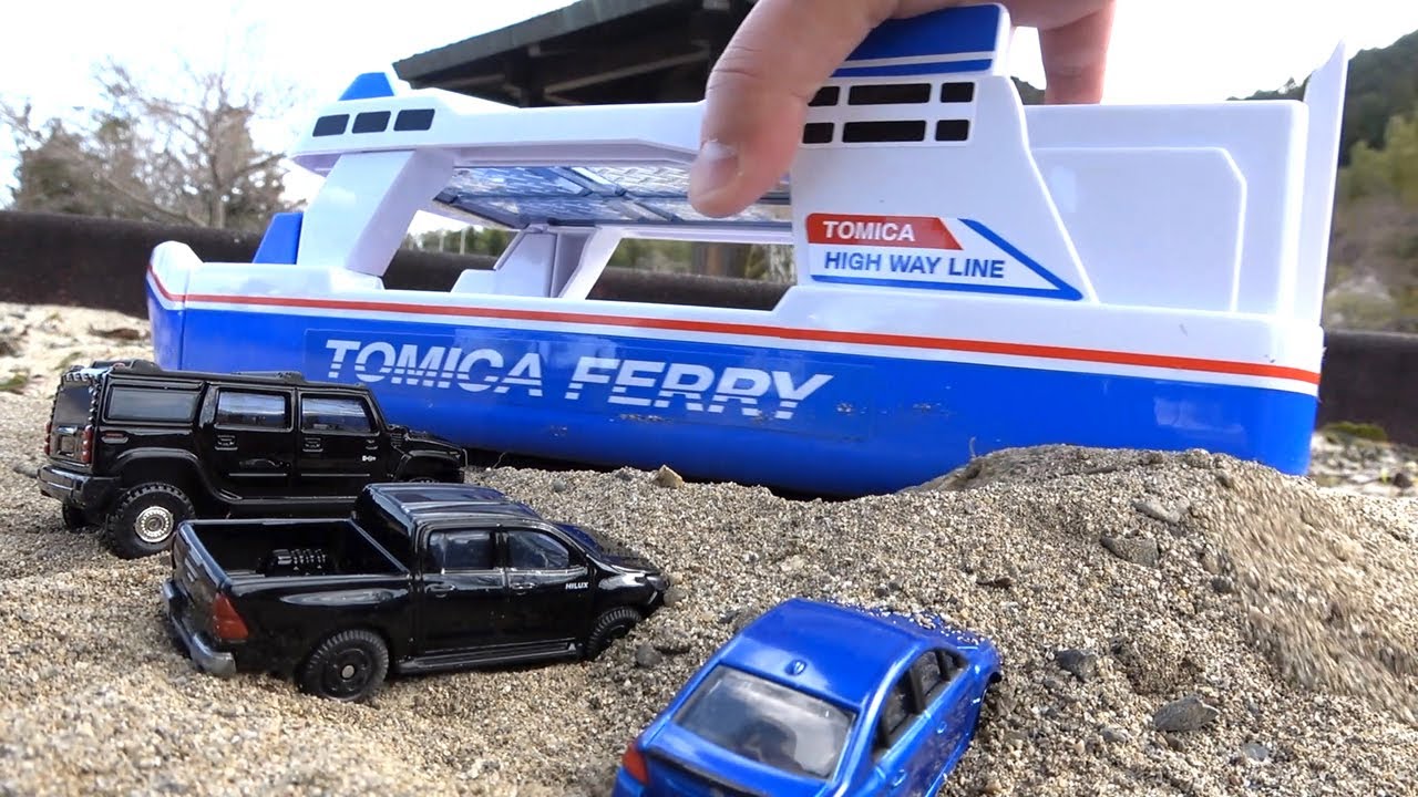 12 cars from around the world [Tomica] & a large Tomica that can hold cars