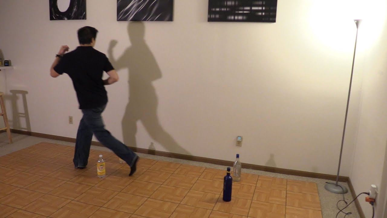 Back Sacada practice using bottles