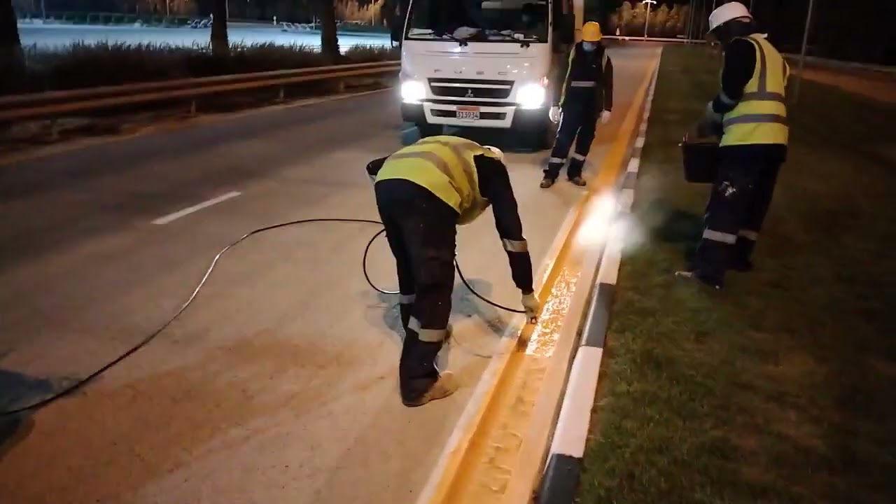 Road marking night work in Bahrain 